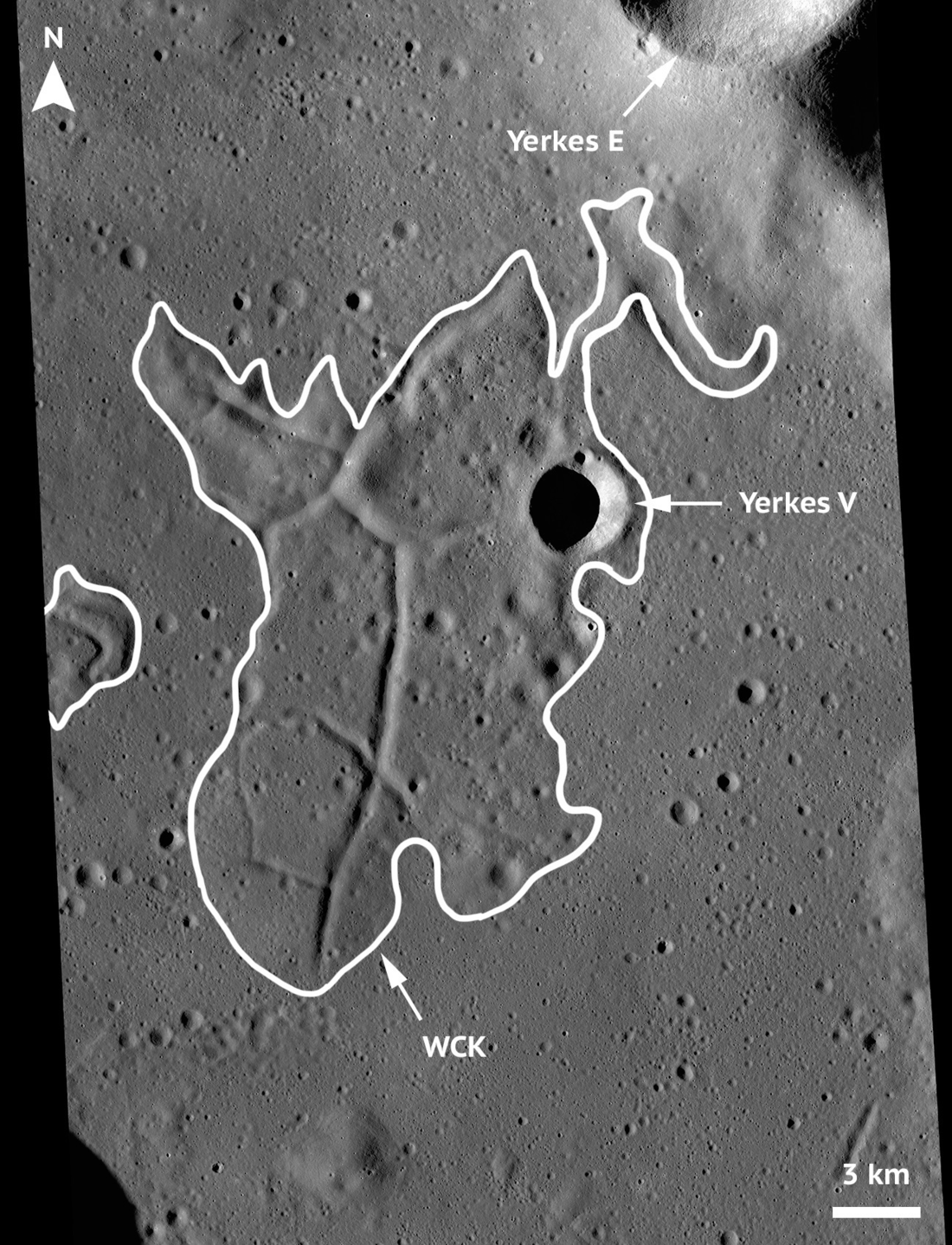 Controlled low-Sun NAC mosaic showing the WCK centered in the middle surrounded by the Mare Crisium. The boundary of the kipuka (where the fractures end) is traced in white. There is a small crater on the right-hand side of the kipuka (labeled Yerkes V), as well as a partial crater in the top right corner of the image (labeled Yerkes E). North is towards the top of the page.