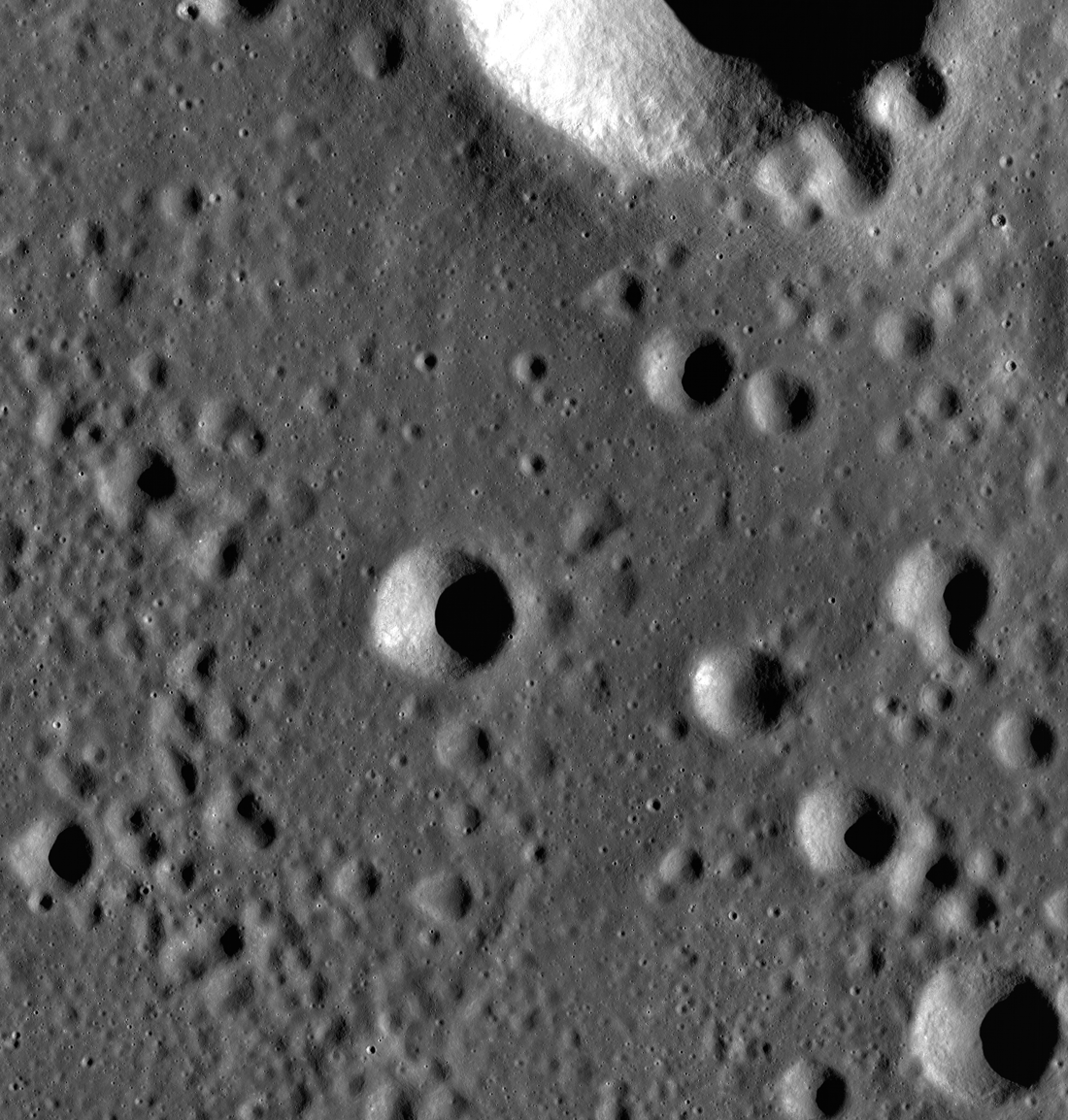 The irregular and simple secondary crater fields south of Blagg crater.