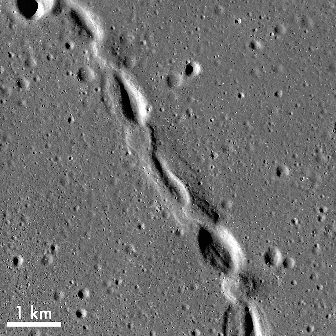 Zoomed in view of collapsed lava tube with 1km measurement