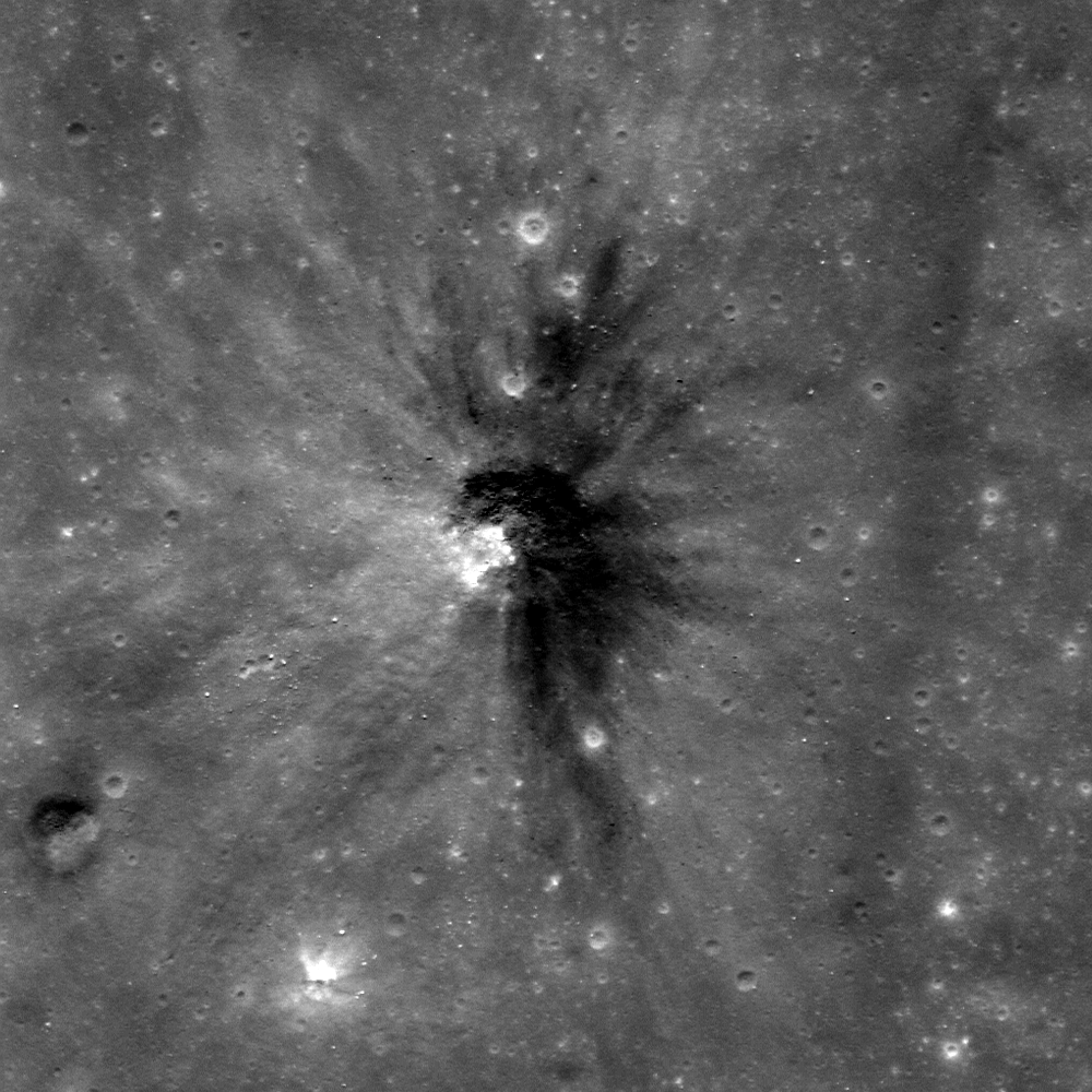 Dark-haloed crater in Mare Humorum