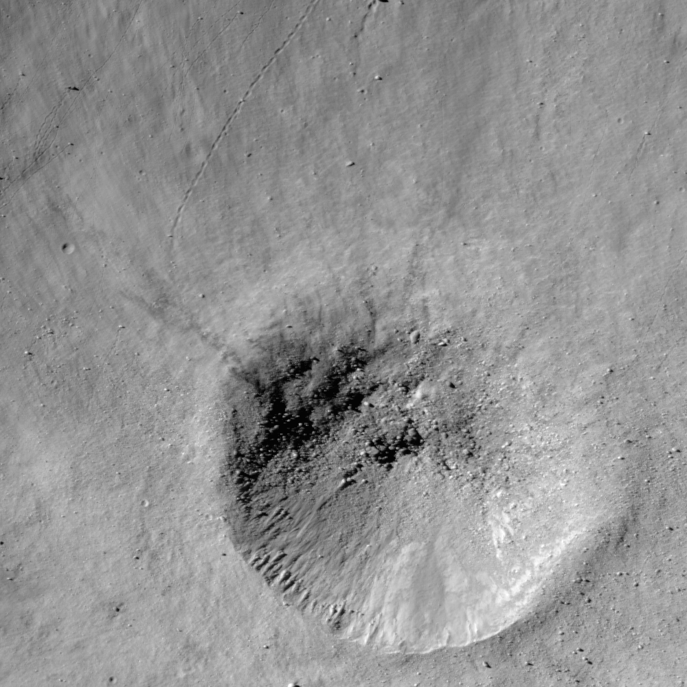 Small crater on the wall of Metius B