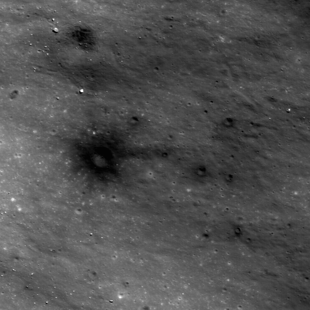 Dark Craters on a Bright Ejecta Blanket